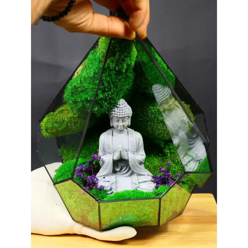 Terrarium with Buddha statue
