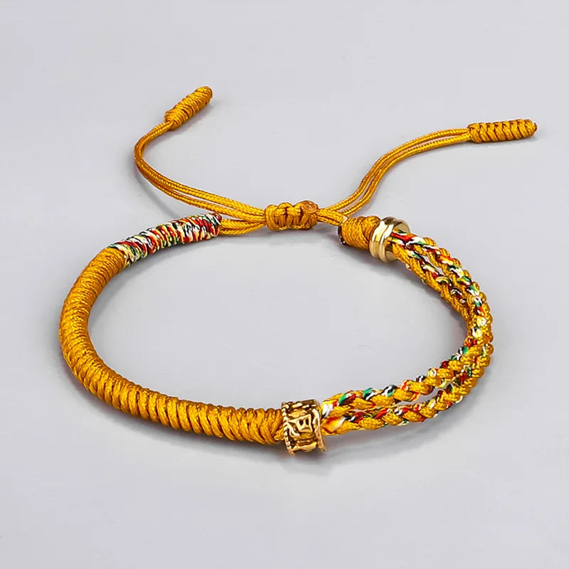 Tibetan Buddhist Monk Bracelet - Handwoven Black & Yellow Cotton Rope | Buddhive