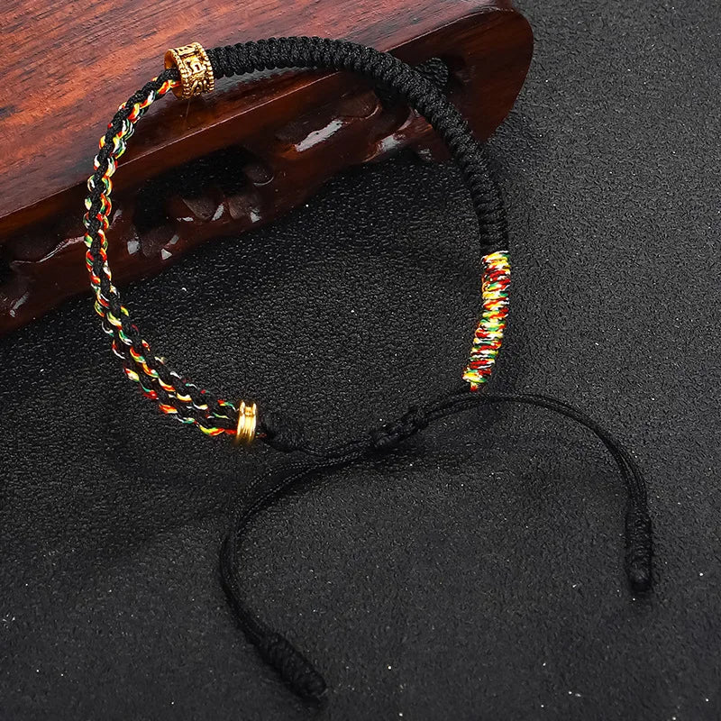 Tibetan Buddhist Monk Bracelet - Handwoven Black & Yellow Cotton Rope | Buddhive