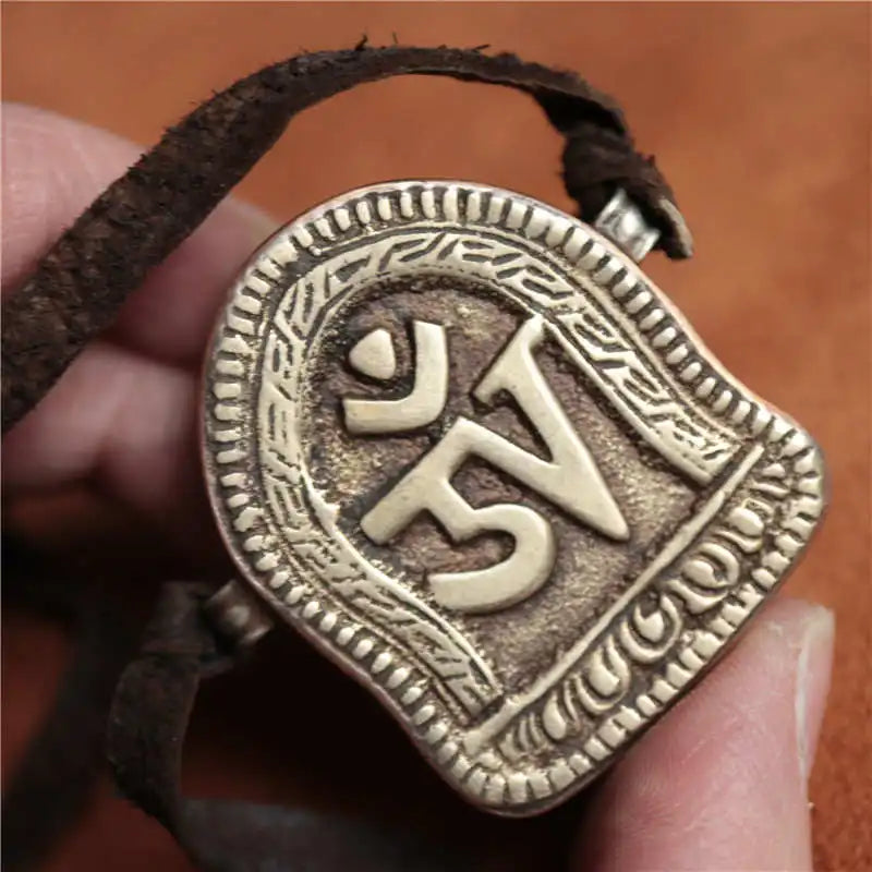 Tibetan Buddhist Amulet Ancient Metal OM Protection Pendant | Buddhive