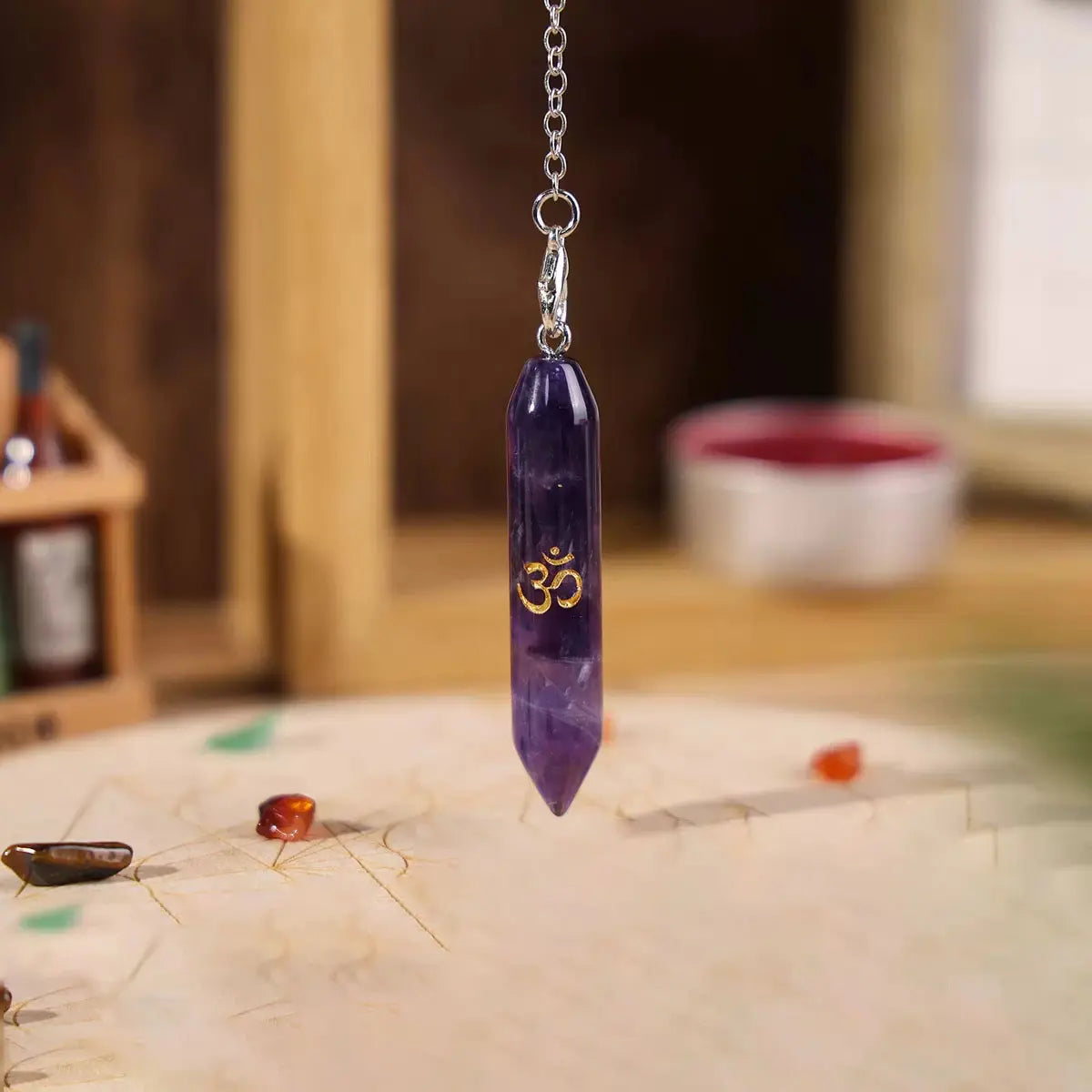 Dowsing Pendulum Natural Stone with OM Symbol - Crystal Divination Tool for Reiki & Energy Work | Buddhive