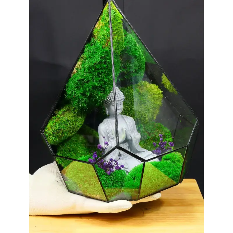 Terrarium with Buddha statue