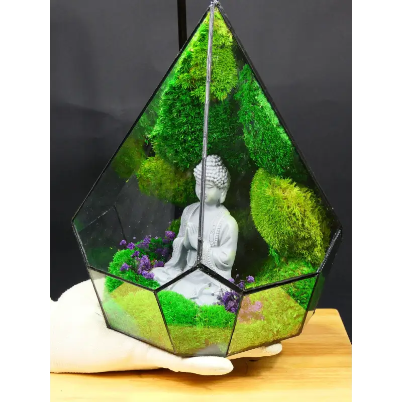 Terrarium with Buddha statue