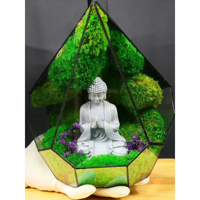 Terrarium with Buddha statue