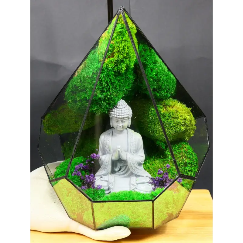 Terrarium with Buddha statue